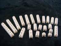 STEATITE CERAMIC BAND HEATER (SMALL) Material: C220 Uncommon Dimensions All dimensions are in M.M. Tolerances for width +0.3mm and height +0.