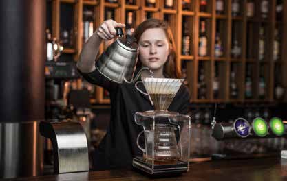 Ann Kristin Fuglum fra Kaffehuset Friele og Øystein Ellingsen fra Bare restaurant i kaffemøte.