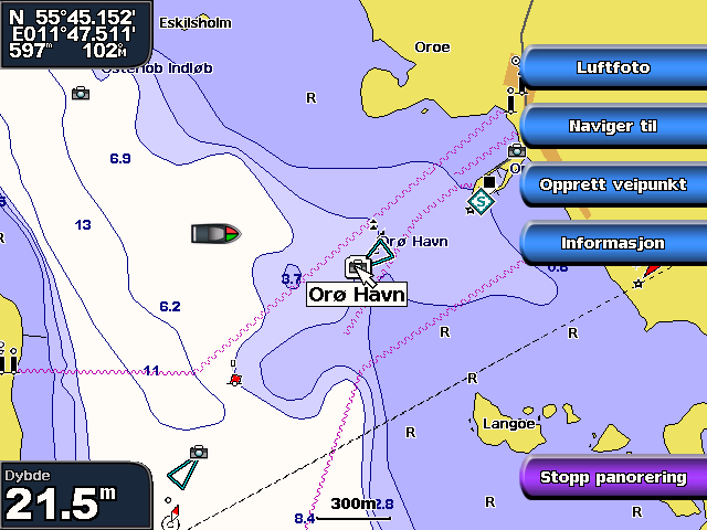 Merk: Bruk knappene SKALA (+/-) (GPSMAP 4000-serien) eller trykk på knappene (GPSMAP 5000-serien) for å zoome inn og ut mens du ser på luftfotoet på full skjerm.