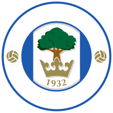 Spørsmål 14 Hvilket lag i den engelske Premier League i fotball har dette emblemet (navnet er fjernet), og er