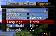 Forandre skjermspråk Du kan bruke fremgangsmåten under til å velge skjermspråk. Antallet og typer språk avhenger det geografiske området hvor kameraet ble markedsført. 1. Trykk [MENU]. 2.