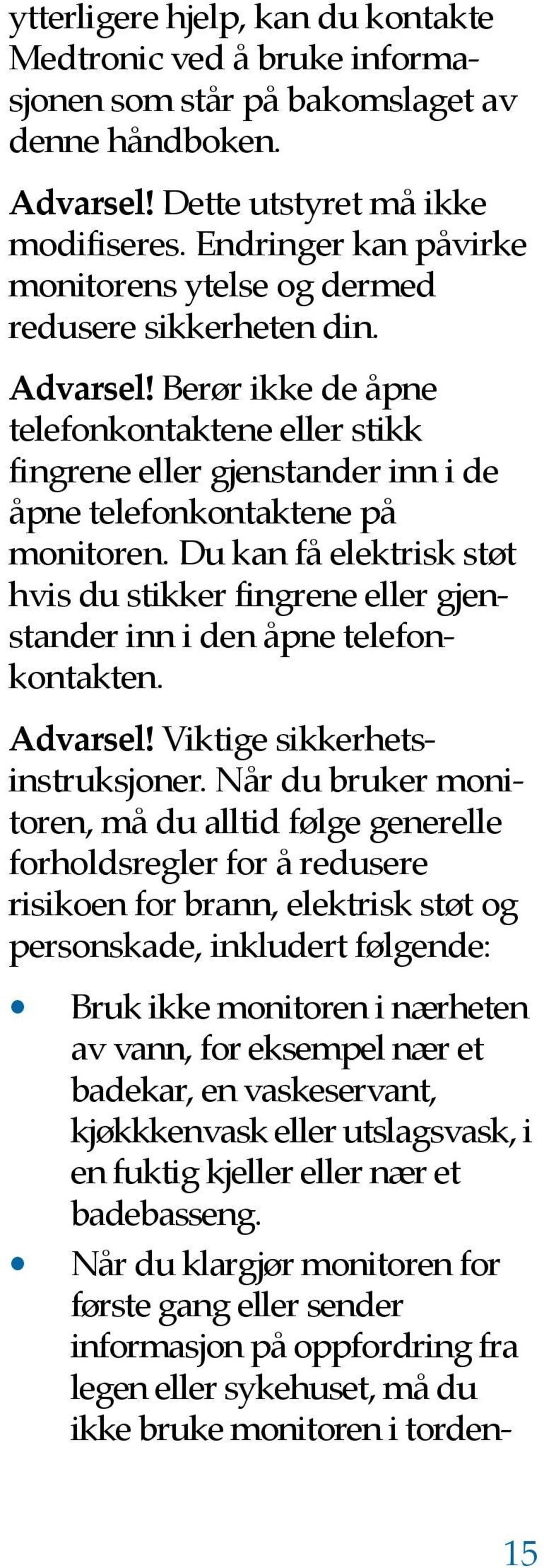 Berør ikke de åpne telefonkontaktene eller stikk fingrene eller gjenstander inn i de åpne telefonkontaktene på monitoren.