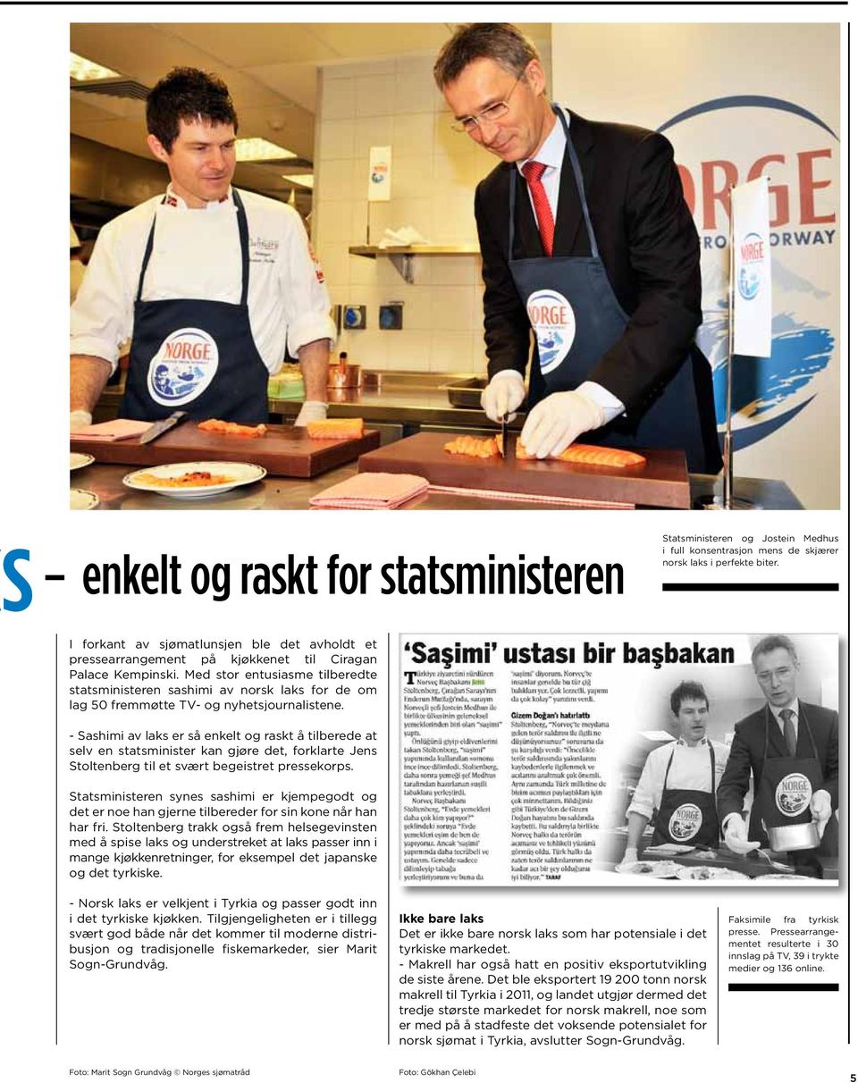 Statsministeren og Jostein Medhus i full konsentrasjon mens de skjærer norsk laks i perfekte biter.