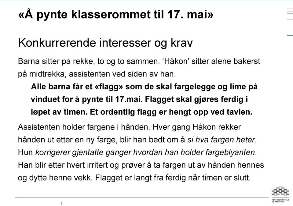 Flagget skal gjøres ferdig i løpet av timen. Et ordentlig flagg er hengt opp ved tavlen. Assistenten holder fargene i hånden.