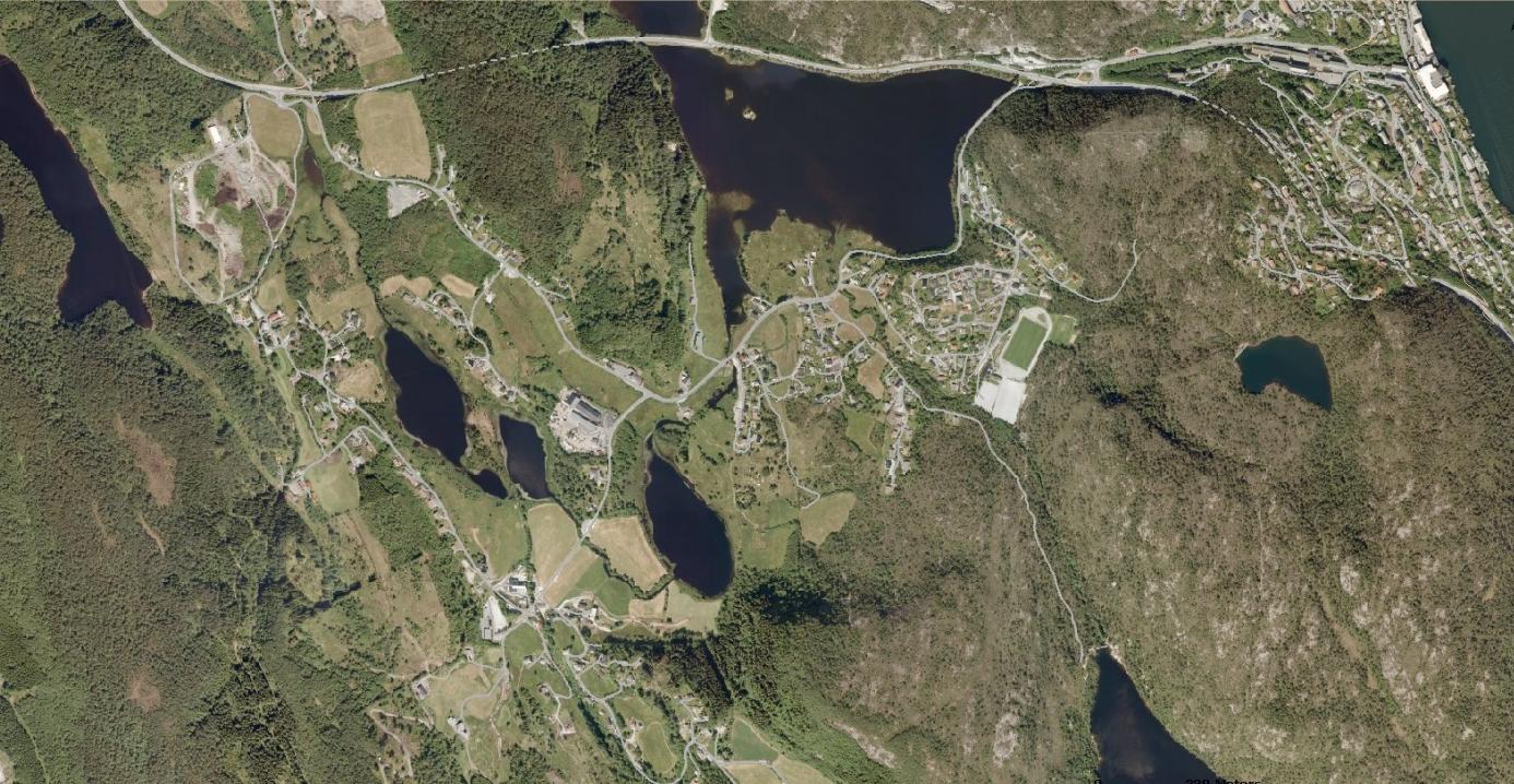 Lokalisering og områdets planstatus 3 LOKALISERING OG OMRÅDETS PLANSTATUS Tiltaksområdet Kvamsvegen 11 ligger ved Haugland, NV i Arna bydel (Fig. 1).