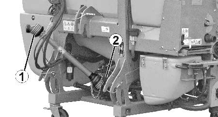 Produktbeskrivelse 4.2 Sikkerhets- og verneutstyr Parkeringsstøtter til høyre og venstre (Fig. 8) for å unngå at den frakoblede maskinen velter Fig. 8 Transportlås (Fig.