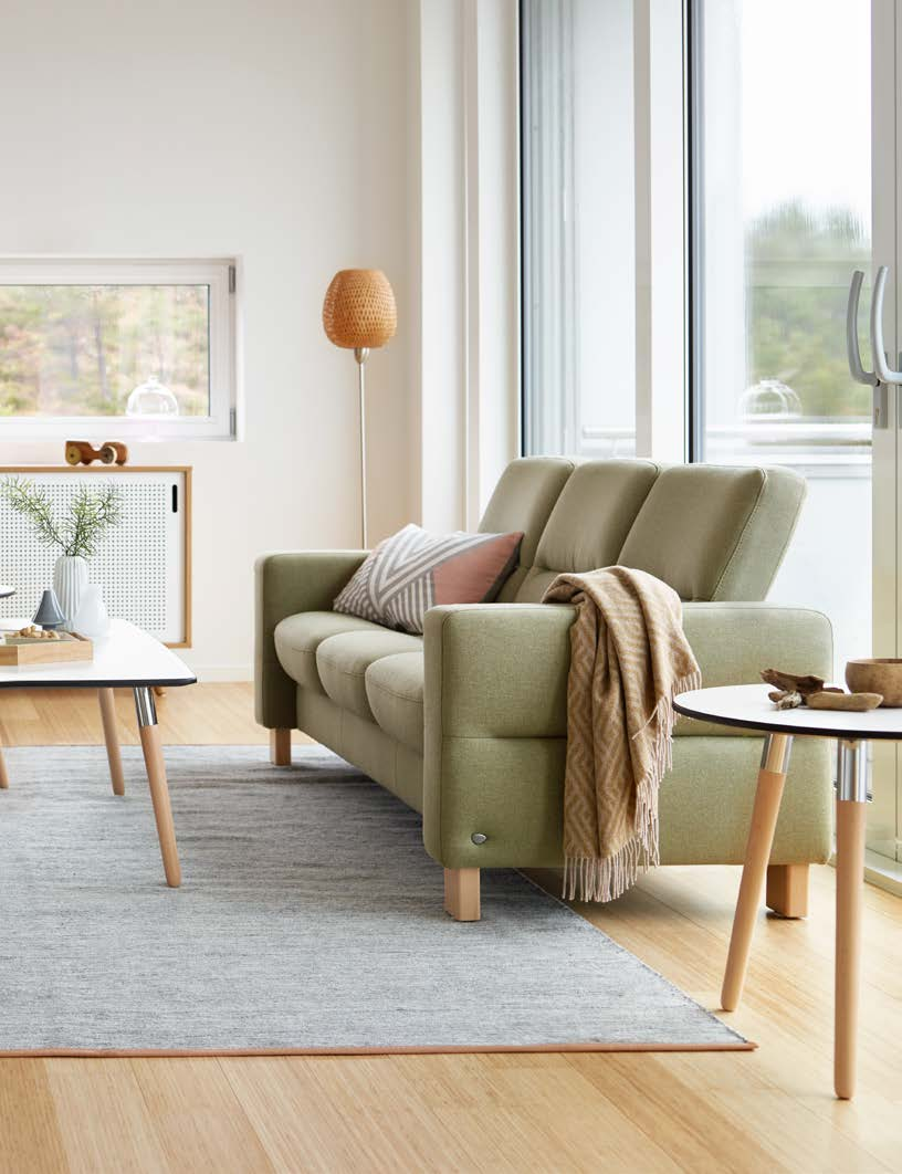 Stressless Wave sofa er vist i tekstil Calido Light Green.