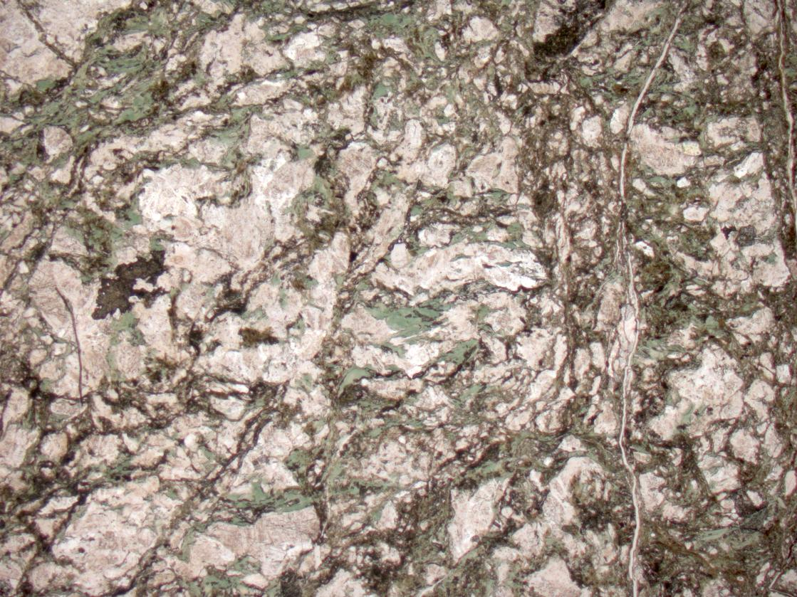 Sample BJARK-05: Core KH2, depth ~32.4 m Visually described as "suspected brittle fault zone with strongly brecciated, cataclastic rock. Formation of secondary minerals such as chlorite".