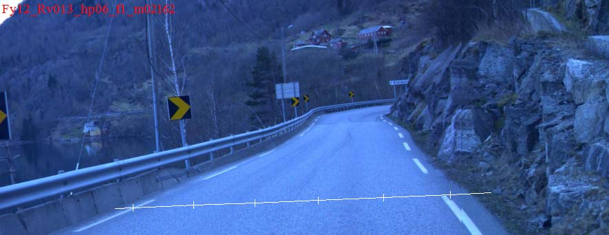 Nr. 12 Bilde nr. 12 Her vises en tunnel der overgang til eksisterende veg er like utenfor tunnelmunning. Før en kommer hit har en kjørt flere km på god veg.