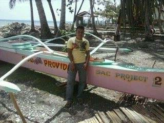 JOHN REL BARCELO WITH HIS NEW PUMPBOAT BLESSING ON FEBRUARY 15,2015 BALANCE INCOME