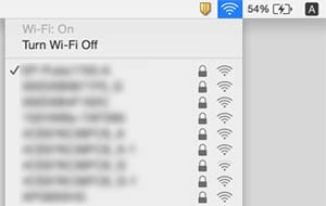 Løse problemer Mac OS X Klikk Wi-Fi-ikonet øverst på skjermen til datamaskinen. En liste over SSID-er vises og den tilkoblede SSID-en angis med et kontrollmerke.