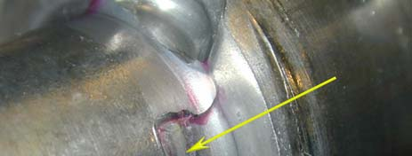 4 failure of the lower torsion bar is believed to have developed as a result of another peak loading that have resulted in propagation of a ductile overload fracture from the initiated low cycle