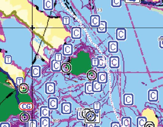 I store zoom-rekkevidder vises tidevann og strøm som et firkantikon inkludert bokstaven T (tidevann) eller C (strøm).