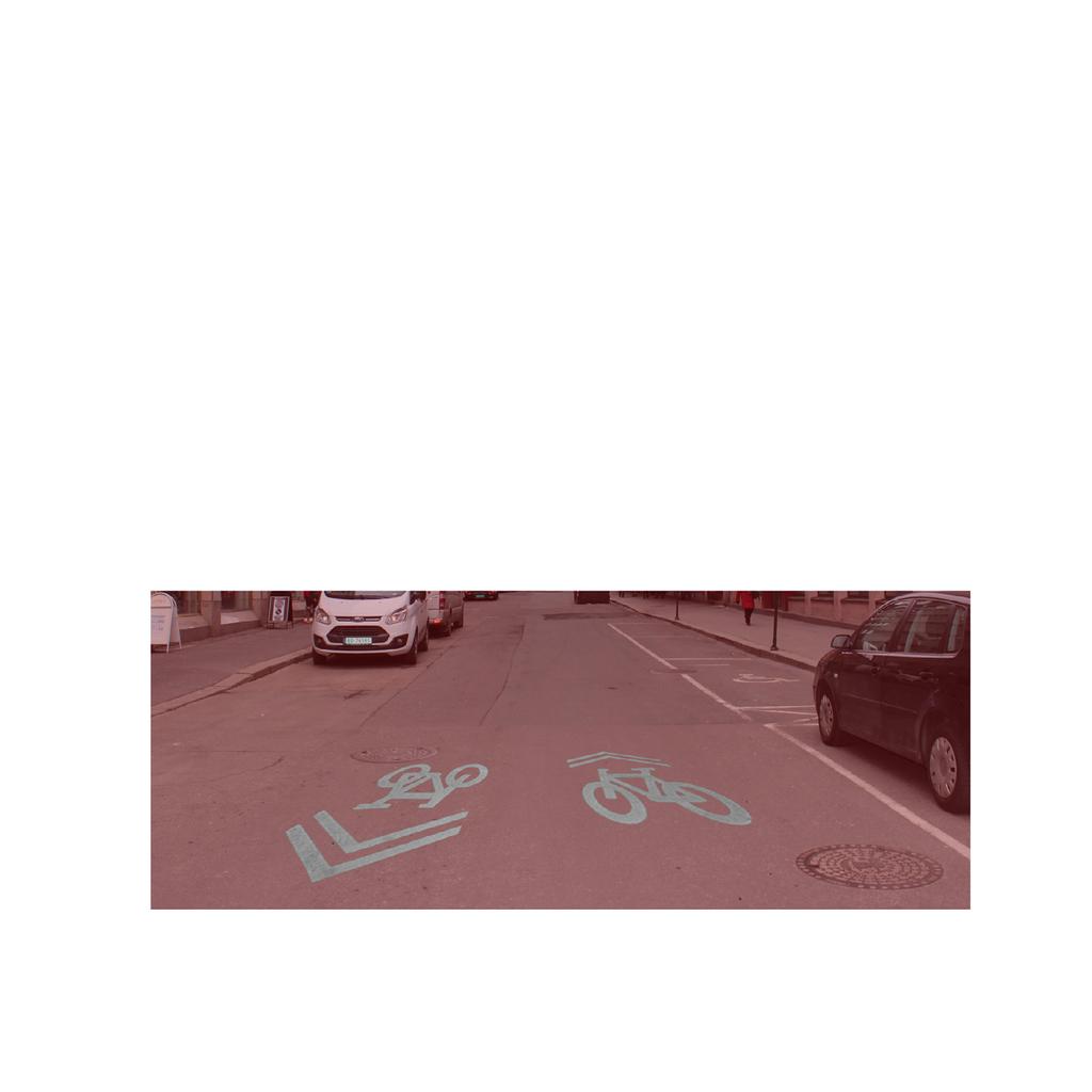 I den nederlandske manualen er det ikke ansett som nødvendig med bufferfelt mellom parkerte biler og sykkelgaten i denne typen gater.