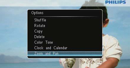 Zoome og panorere et bilde 1 Velg [Zoom and Pan], og trykk deretter på. Norsk 2 Trykk på for å zoome inn i et bilde, og trykk deretter på. Trykk på for å zoome ut i et bilde, og trykk deretter på.