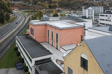 5 Pakkhus A (Bygg 95) Pakkhus A i 1916 og i dag. Foto til venstre: Norsk Industriarbeidermuseum. Foto til høyre: www.hydroparken.no Oppført: 1915-1916. Arkitekt: Ukjent.