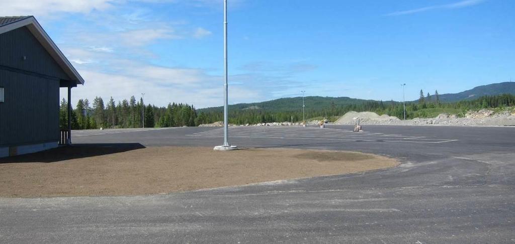 En vil kunne oppnå et tilfredsstillende landskapsbilde med skogen som delvis bak- og sidevegger, slik at næringsområdet vil kunne bli et fint element i landskapet.