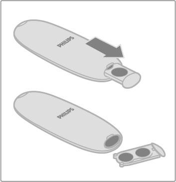Når du skal skifte batterier på fjernkontrollen, skyver du opp det lille rommet nederst på fjernkontrollen. Bruk to myntformede batterier (type CR2032 3 V).