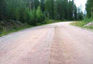 snarlig behov for tiltak. (Foto: Vägverket) Tilstandsgrad 1 beskrives slik for vaskebrett: Vegbanen er for det meste jevn og fast.