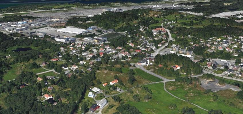 Verdien settes til middels. Figur 39: Blomsterdalen sett fra sørøst. Flyplassen i bakgrunnen.