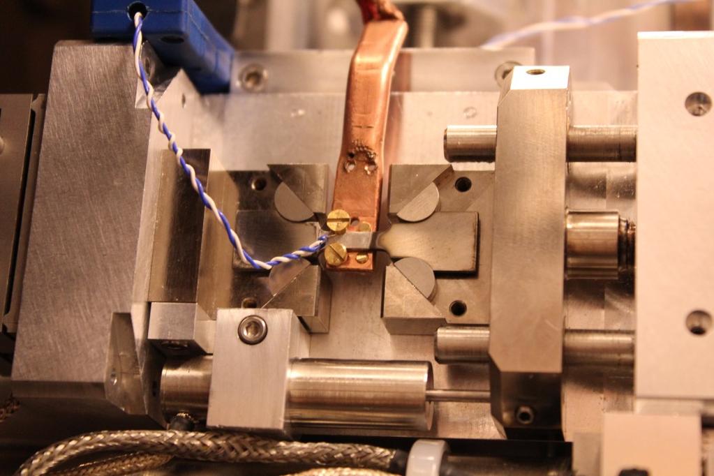 Jonas Hovde Pedersen Masteroppgave Figure 24: Mount the thermocouple under one of the screwheads as shown in the picture. Be gentle but make sure it is stuck.