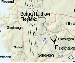 F) Ståsted fra Lønningen næringsområde Dagens situasjon: Kongshaugen er fremtredende sett fra den sørlige delen av flyplassområdet.