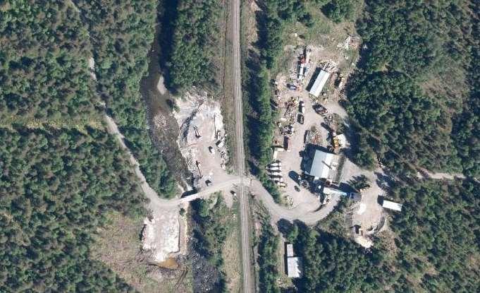 Foto 11: Flyfoto fra 2014 over dumpingplass for