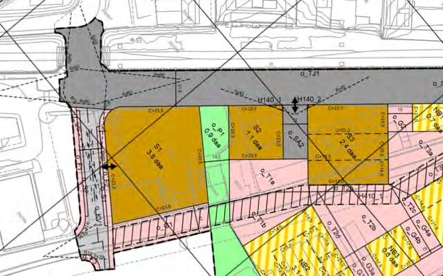 Figur 733: Til venstre vises områdeplanen for midtre del av Havneparken med innkjøring til parkeringsanleggene vist med svart pil.