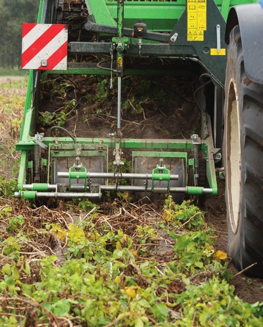 Potetene ledes deretter til den romslige tanken. Så fort tanken er full, kan den raskt tømmes ved å benytte hurtigtømmingsfunksjon på bunnbelte.