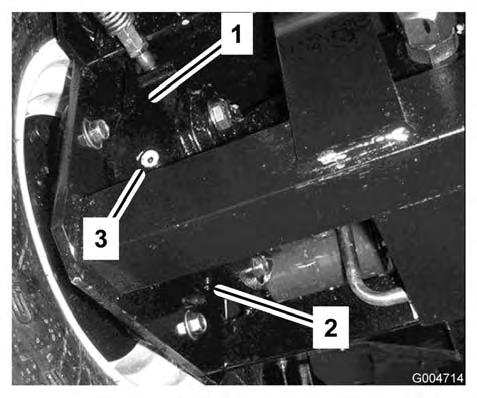 4. Plasser et tappefat under bremsehuset på den andre siden av hjulet (Figur 58). 5. Fjern pluggen fra under bremsehuset og la oljen renne ut. 6.