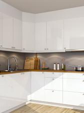 Kjøkken med kjøkkenfronter i hvit høyglans er inkludert i stilen.