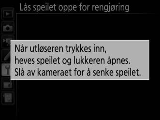 4 Trykk på J. Meldingen til høyre vises på skjermen, og en rad med streker vises på kontrollpanelet og i søkeren.