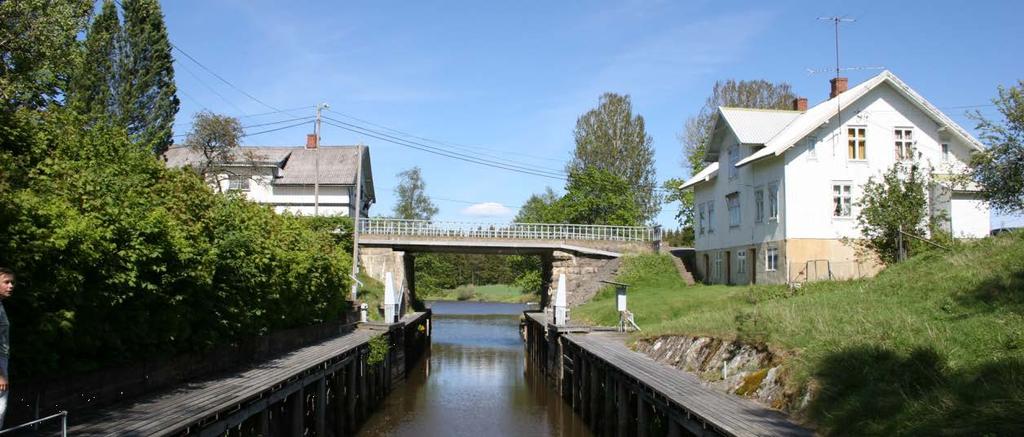 Strømfoss med sine sluser, damanlegg, kraftstasjon og mølle utgjør et kulturmiljø i nordenden av Aremarksjøen. (foto: Lars Ole Klavestad). 18.