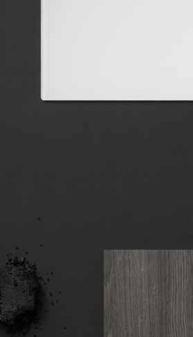 EDGY & SOFISTIKERT Skarpe kontraster i svart og hvitt, balansert med grånyanser og naturlige tresorter for et sofistikert uttrykk.
