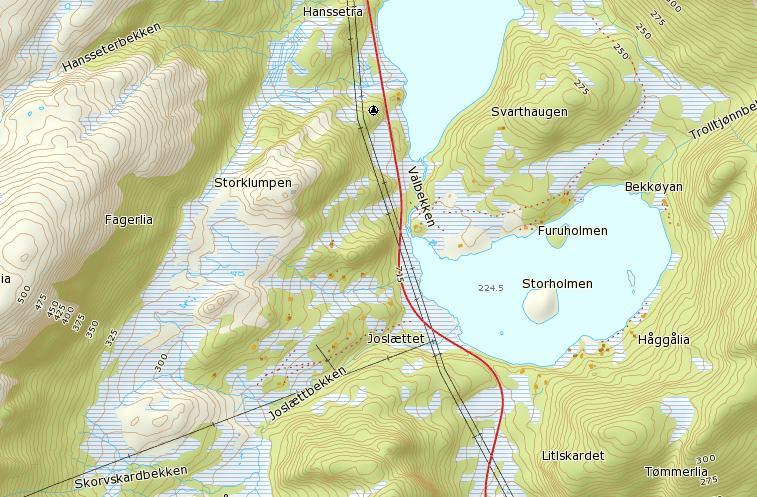 Tidligere analyser NGUs Pukkdatabase viser at det er utført analyser på materialet i området, markert som punkt 1 i figur 4. Punkt 2 er prøvetakingsstedet i «Olsøysvingen». 1 2 Figur 4.