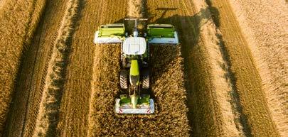 1 Sammenlegging av flere strenger: Begge båndene er slått ned for å legge sammen strengene. Da lager DISCO 9200 C AUTOSWATHER en perfekt streng for høsting av biomasse.