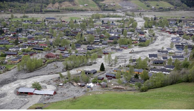 Skred og flom i arealplanleggingen Kvam