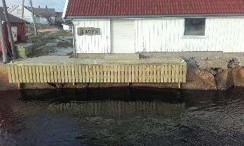 Laget dobbel-toa og fornyet tak med shingel i Tesebukta.