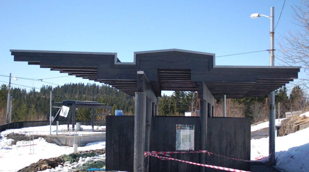 Åpent leskur med skistativ på utgående side, tegnet av arkitekt Arne Henriksen, 2010.