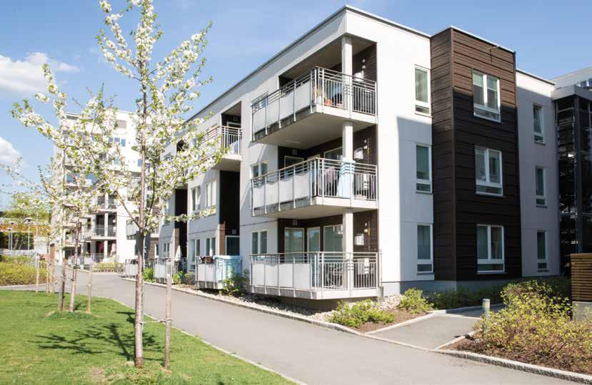 På Lørenkvartalet i Oslo valgte arkitekten fasadematerialer i en kombinasjon av naturstein og tre.