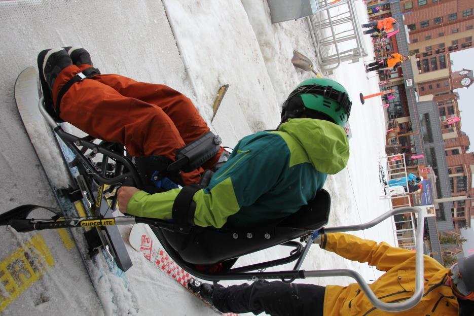 5) Mens du venter på stolen, dra hendelen bakover til Load/Ski posisjon.