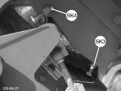 ut under bruken. - Skruen (SK4) for den øvre knivbjelken. - Skruen (SK3) for den nedre knivbjelken.