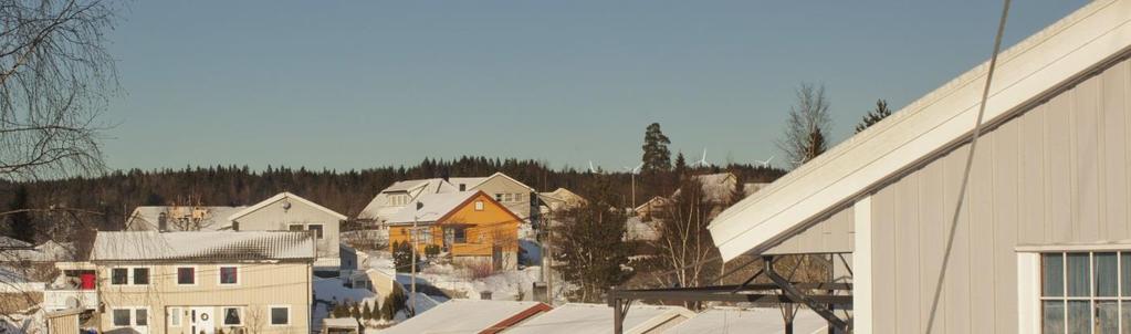 Figur 5-24. Standpunktet viser noen rotorblader fra turbinene i Bjelkeberg sett fra Nordåsen. Øvirge turbiner er bakenfor skogen. Figur 5-25.