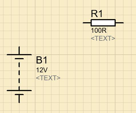 til høyre for batteriet.