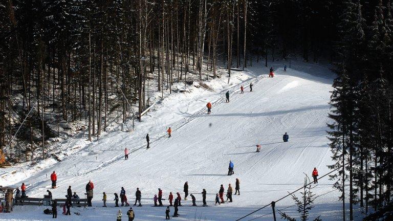 Sarping sentral i kinesisk skisatsing Tre ganger