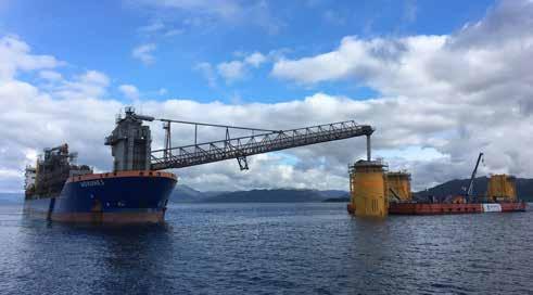 Te Chain dimension: 147 mm Preparing for towing in sunset. Monitoring pull in of anchor chain. Close to midnight on the 18th of July 2017 an unusual sight could be seen in the fjord outside Stord.