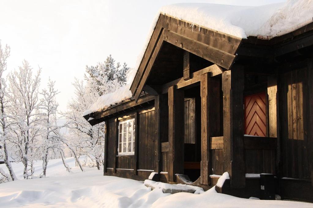 Hvit jul Med stavlaft-hytte i Skardfjellgrenda er du og dine sikret mye god julestemning.
