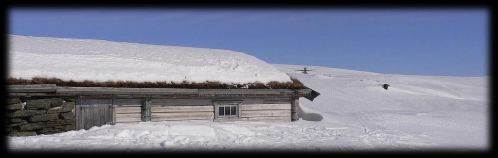 Fongen i bakgrunnen Når Kvernfjellvatnet passeres, svinger løypa sørover mot Roltdalen.