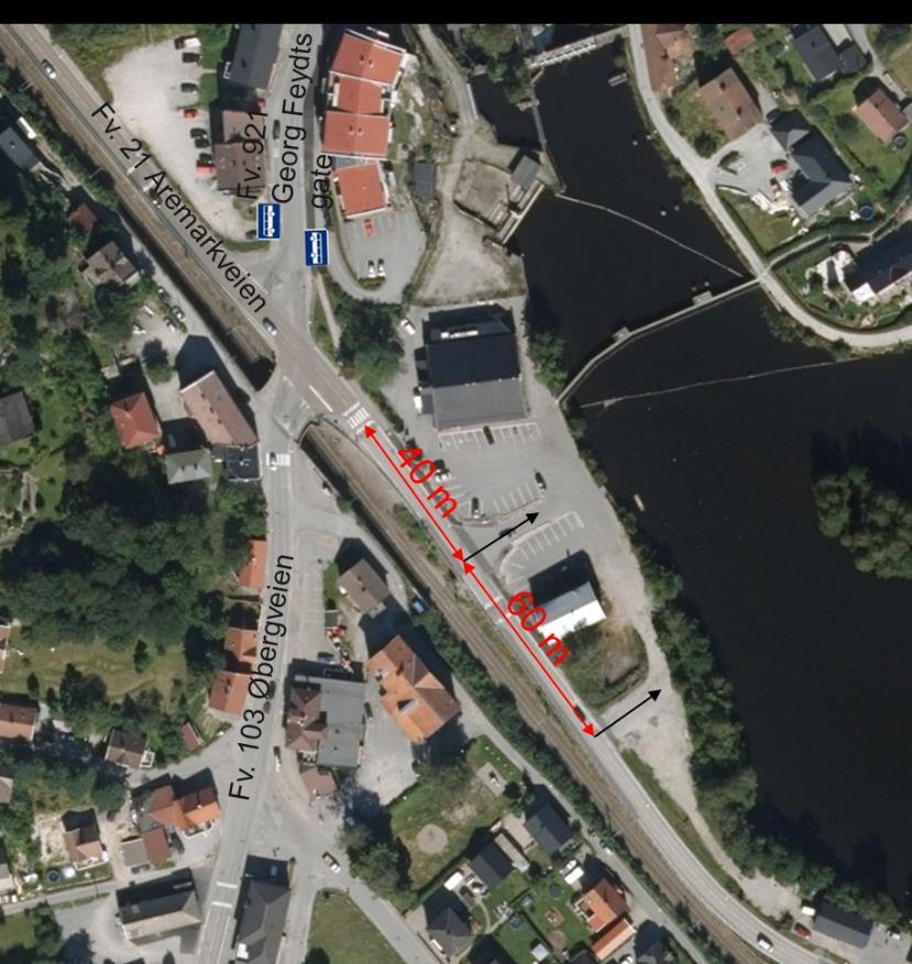 21 Aremarkveien, henholdsvis 40 meter og 100 meter øst for krysset med fv. 103 Øbergveien.