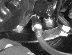 Monter styrektutorens påfyllings- og dreneringsskrue og -skive så rskt som mulig. Strm fylle/tppe-skruen til spesifisert moment. Beskrivelse Nm l-in. l-ft Styrektutorens fylle- og tppeskrue 6.